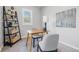 Bright home office featuring a window, desk, and stylish decor at 300 N Church St, Arcadia, IN 46030