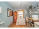 Charming eat-in kitchen with brick flooring, decorative accents, and a cozy atmosphere at 3004 Sheridan St, Anderson, IN 46016