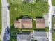 Bird's eye view of the home, garage, landscaping and surrounding neighborhood at 310 W Jackson St, Alexandria, IN 46001