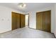 Carpeted bedroom featuring two spacious closets at 310 W Jackson St, Alexandria, IN 46001