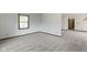 Well-lit bedroom with carpet flooring and a small closet at 310 W Jackson St, Alexandria, IN 46001