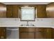 Well-lit kitchen area showing a window above the stainless steel double sink at 310 W Jackson St, Alexandria, IN 46001