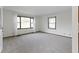Bright living room with natural light and neutral colored carpet at 310 W Jackson St, Alexandria, IN 46001