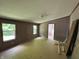 Bedroom with gray walls, two windows for natural light, and a doorway to another room at 3587 Lower Patton Park Rd, Martinsville, IN 46151
