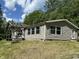 Ranch style home with a light colored exterior, open porch and windows with light colored trim at 3587 Lower Patton Park Rd, Martinsville, IN 46151