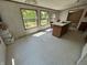 Spacious eat-in kitchen featuring an island with sink, linoleum floors and views of the front yard at 3587 Lower Patton Park Rd, Martinsville, IN 46151