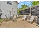 An outdoor patio with outdoor dining table, umbrella and seating, perfect for entertaining at 3624 Woodcliff Dr, Indianapolis, IN 46203