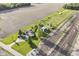Aerial view showcases a beautiful home with meticulous landscaping, surrounded by cultivated fields and lush greenery at 3840 W 38Th St, Anderson, IN 46011
