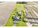 Overhead view showcases the spacious property, including the home, garden, outbuildings and surrounding fields at 3840 W 38Th St, Anderson, IN 46011
