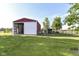 Large barn featuring an open bay for storage or workshop use at 3840 W 38Th St, Anderson, IN 46011
