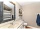 Inviting bathroom with neutral tones, decorative mirror, and bathtub shower at 3840 W 38Th St, Anderson, IN 46011