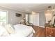 Bright bedroom features a large closet, hardwood floors, neutral colors and a side door at 3840 W 38Th St, Anderson, IN 46011
