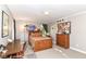 Comfortable bedroom featuring a wood-frame bed, natural light, and ample space at 3840 W 38Th St, Anderson, IN 46011