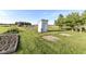 The garden features a variety of planting beds, a small outbuilding, and an old garden shed at 3840 W 38Th St, Anderson, IN 46011