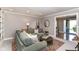 Cozy living room with comfortable sofa, decorative rug, and an open doorway view at 3840 W 38Th St, Anderson, IN 46011