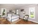 Comfortable bedroom with natural light, complemented by classic furniture and a serene atmosphere at 3840 W 38Th St, Anderson, IN 46011