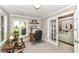 Comfortable home office featuring a desk, chair, and natural light with view to exterior at 3840 W 38Th St, Anderson, IN 46011