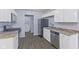 Bright kitchen featuring stainless steel appliances, granite countertops, and white cabinets at 3898 S Randolph St, Indianapolis, IN 46227