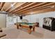 Finished basement with a pool table, tanning bed and jukebox at 4157 Taunton Ct, Plainfield, IN 46168