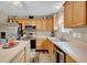 Functional kitchen with stainless appliances and light countertops at 4157 Taunton Ct, Plainfield, IN 46168