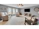Relaxing living room with lots of natural light and comfortable seating at 4157 Taunton Ct, Plainfield, IN 46168