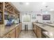 Finished basement bar has ample counter space, wine racks, and a sink, ideal for mixing your favorite drinks at 4642 Big Run Ct, Indianapolis, IN 46239