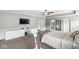 Large main bedroom featuring gray walls, a workout area, and plenty of closet space at 4642 Big Run Ct, Indianapolis, IN 46239