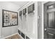 Mudroom featuring personalized storage lockers, decorative accents, and convenient access to the home's interior at 4642 Big Run Ct, Indianapolis, IN 46239