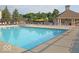 Community pool with ample lounge chairs, covered seating and sun shade providing a resort-like atmosphere at 4642 Big Run Ct, Indianapolis, IN 46239