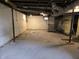 Unfinished basement offers potential for customization and additional living space at 509 Shelby St, Shelbyville, IN 46176