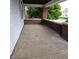 Covered front porch with brick columns, providing a welcoming entrance and view of neighborhood at 509 Shelby St, Shelbyville, IN 46176