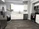 Kitchen featuring stainless steel refrigerator, range, and marbled countertops at 509 Shelby St, Shelbyville, IN 46176