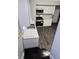 Modern kitchen featuring stainless steel appliances, white cabinets, and updated countertops at 509 Shelby St, Shelbyville, IN 46176