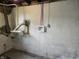 Plumbing lines ready for appliance hookups at 509 Shelby St, Shelbyville, IN 46176