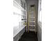 Storage room features shelves and dark wood vinyl floors at 509 Shelby St, Shelbyville, IN 46176