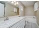 Bright bathroom with double sink vanity and tub at 5258 Brassie Dr, Indianapolis, IN 46235