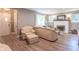 Cozy living room featuring a fireplace, comfortable seating, and wood-look flooring at 5315 Camden St, Indianapolis, IN 46227