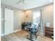 Functional office featuring a sliding barn door, modern desk setup, and ample natural light at 5315 Camden St, Indianapolis, IN 46227