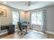 Bright office space with a large window providing natural light, modern desk, and comfortable chair at 5315 Camden St, Indianapolis, IN 46227