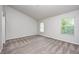 Bedroom featuring neutral colors and bright, naturally lit windows at 5677 Brownstone Dr # 5677, Indianapolis, IN 46220
