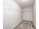 Walk-in closet with shelving for maximum storage at 5677 Brownstone Dr # 5677, Indianapolis, IN 46220