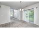 Spacious living room with vaulted ceilings, natural light and sliding doors at 5677 Brownstone Dr # 5677, Indianapolis, IN 46220