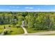 Aerial view of the home surrounded by trees at 5710 W 650 N, Thorntown, IN 46071