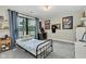 Well-decorated bedroom featuring a large window, desk, and tasteful wall decor at 5710 W 650 N, Thorntown, IN 46071