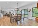 Bright dining room with view to backyard and open to kitchen area at 5710 W 650 N, Thorntown, IN 46071