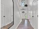Hallway with hardwood floors and white trim at 5710 W 650 N, Thorntown, IN 46071