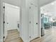 Bright hallway with white doors and modern flooring at 5710 W 650 N, Thorntown, IN 46071