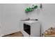 The laundry room includes a washer, dryer and shelving at 5710 W 650 N, Thorntown, IN 46071