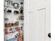 Organized pantry shelves stocked with a variety of food items and storage containers at 5710 W 650 N, Thorntown, IN 46071