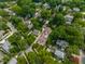 An aerial view capturing a charming neighborhood, revealing lush greenery and varied architectural styles at 5805 Forest Ln, Indianapolis, IN 46220